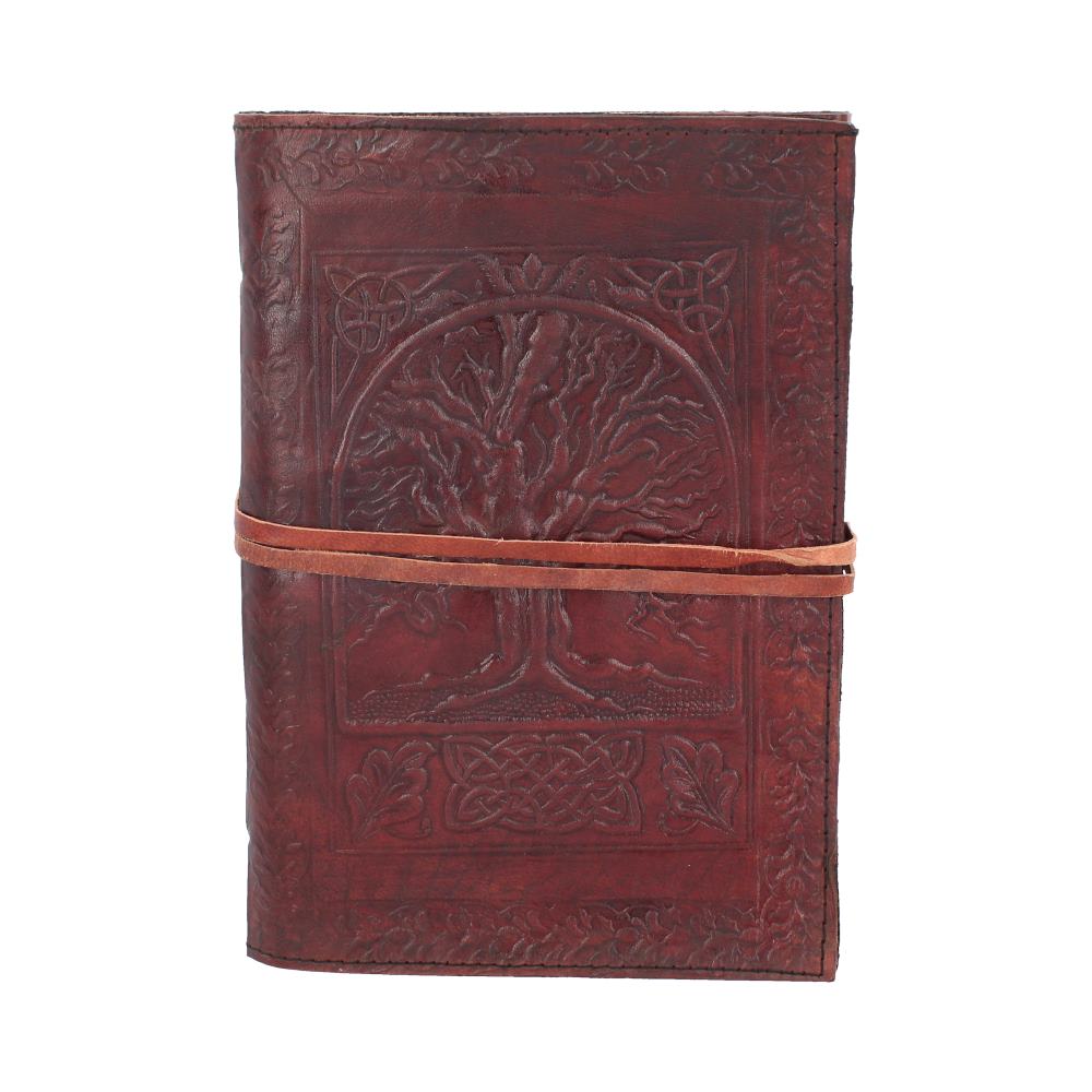 A brown leather journal features an embossed tree design on the cover, with a wrap-around leather strap securing it, set against a plain white background.