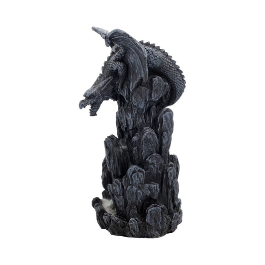 A dragon statue, perched atop a rock formation, emits incense.  The piece is dark gray, possibly resin.