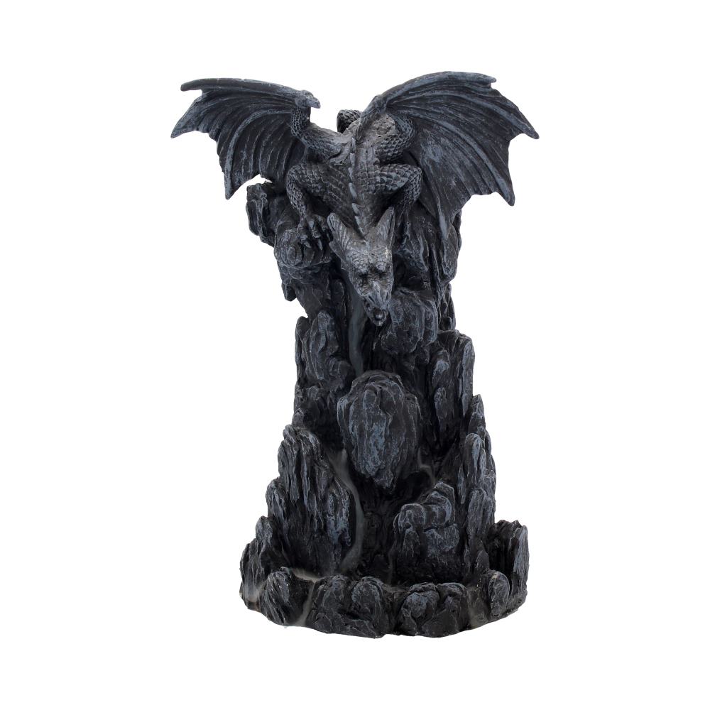A black dragon figurine perches atop a rocky, incense burner base against a white background.