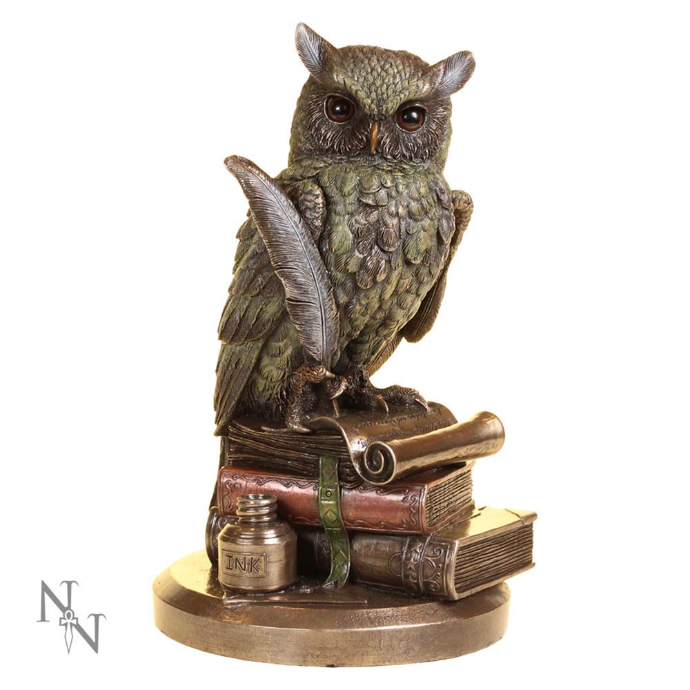A detailed owl statue perches on books, holding a quill. An ink pot labeled "INK" rests nearby, all situated on a round base with a decorative monogram "N" and "t".