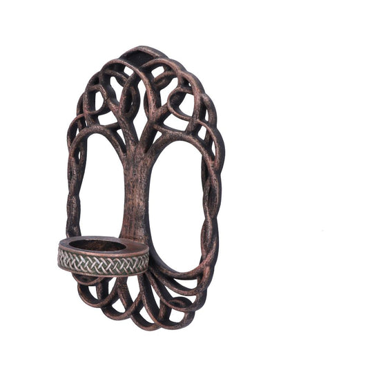Bronze-finished tree-shaped metal wall sconce cradles a shallow round candle cup with a Celtic knot band, displayed against a plain white background.