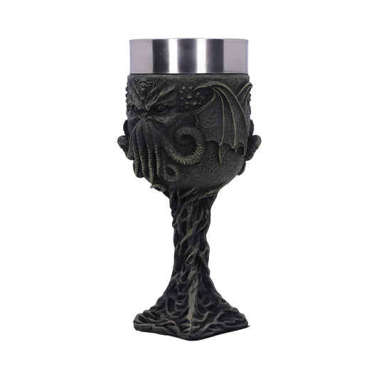 A chalice, with a metallic silver cup, stands on a white background, its base resembling twisted roots and the bowl featuring a Cthulhu-like face with wings.