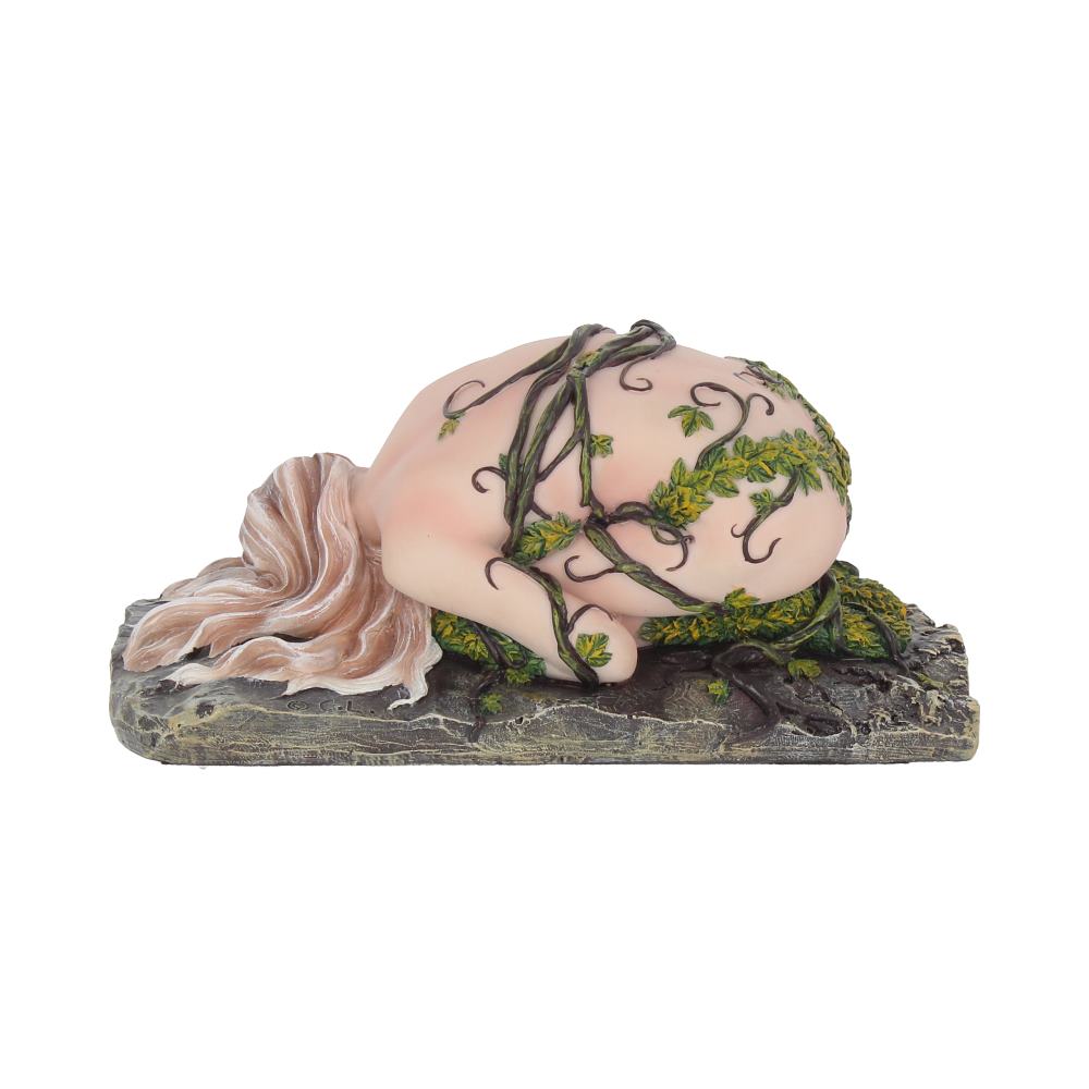A figurine of a woman is curled up, enveloped in vines, on a textured, stone-like base, creating an earthy, serene atmosphere.