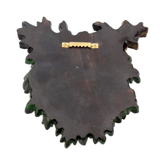 Carved wood wall plaque with scalloped leafy edges and green painted accents fitted with a gold sawtooth hanger for mounting against a plain white background.