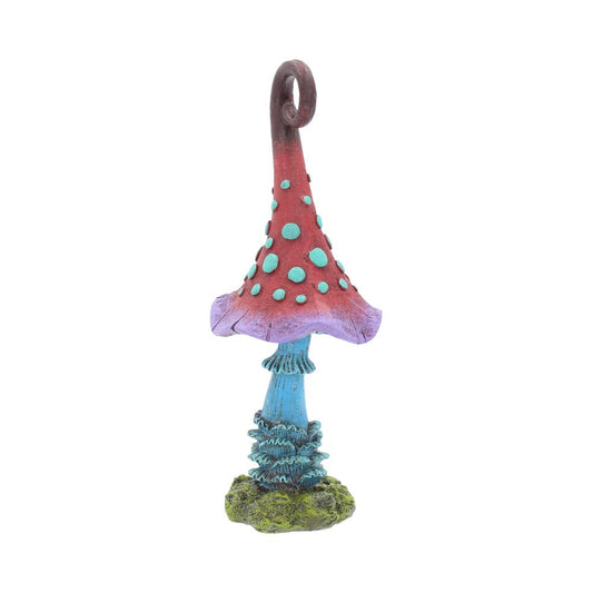 A spotted red and purple mushroom stands on a small green base. It has a curled loop on the top of the cap. The stem is blue.