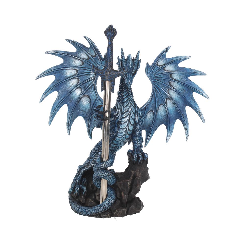A blue dragon figurine holds a sword, serving as a pen holder, perched on a rock base against a white background.