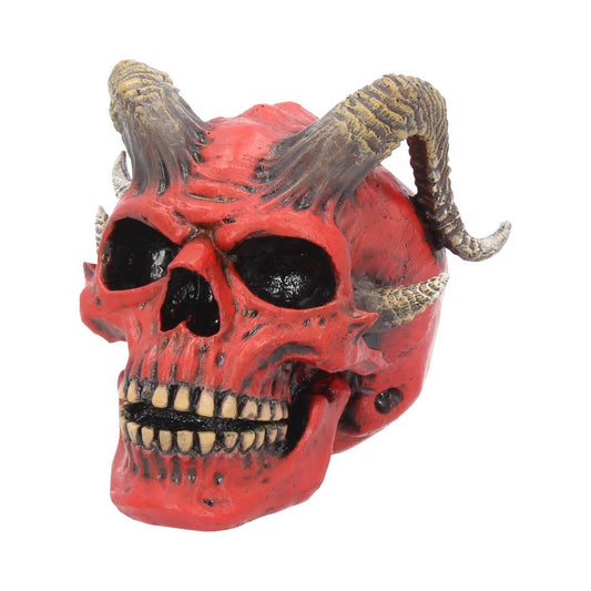 A red skull with prominent horns displays a menacing expression, featuring dark eye sockets and visible teeth. It's set against a plain white background.