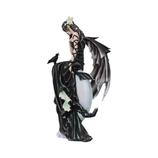 A fairy statue with dragon wings sits on an orb, wearing a black gown adorned with flowers. A small black bird perches on her knee. The background is plain white.