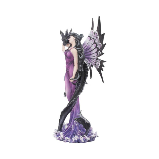 A figurine depicts a woman in a purple dress with black dragon wings embracing a dragon, set against a plain white background.