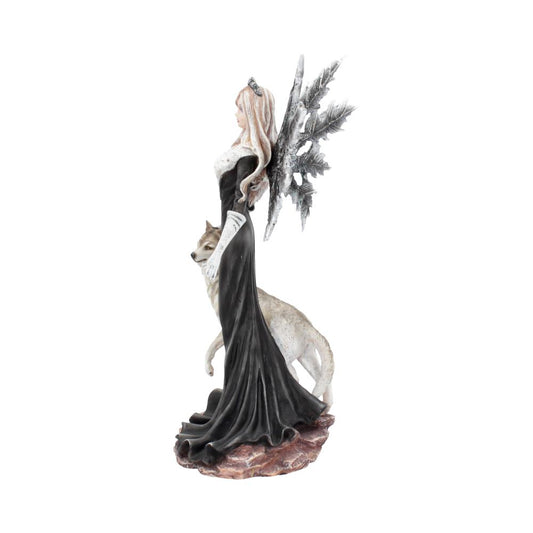 A fairy figurine in a flowing black dress stands alongside a wolf, set on a rocky base. The fairy has ornate wings and long hair, evoking a mystical atmosphere.