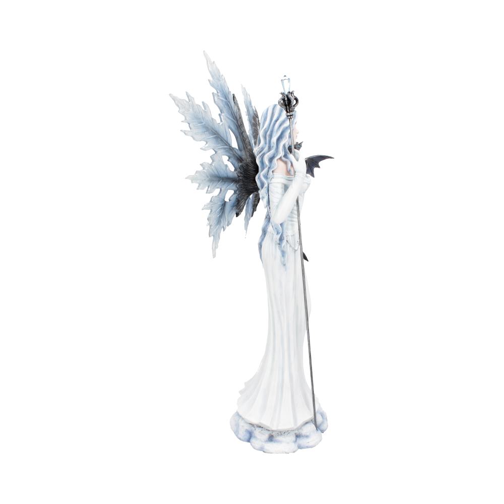 A pale fairy figurine in a white dress stands, holding a scepter. She has snowflake wings, ice-blue hair, and black bat wings, all against a white backdrop.