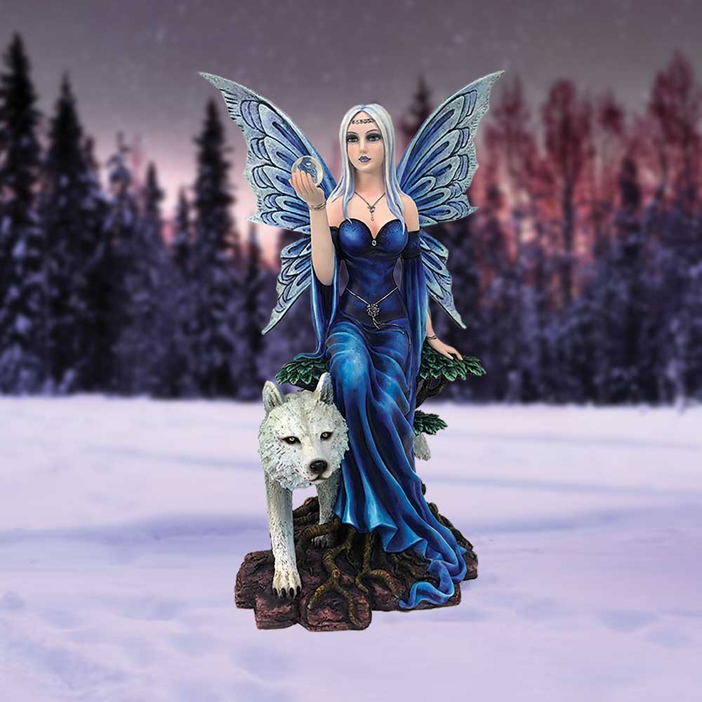 A winged fairy wearing a blue gown sits on a tree stump while holding a clear orb, as a white wolf stands guard at the base, set in a snowy forest.