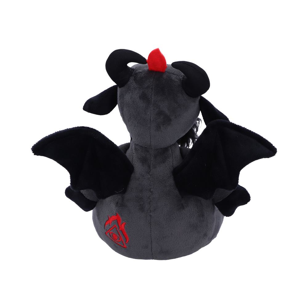A plush toy dragon sits with black wings outstretched, red insignia on its body, and a small red crest atop its head in a white studio setting.