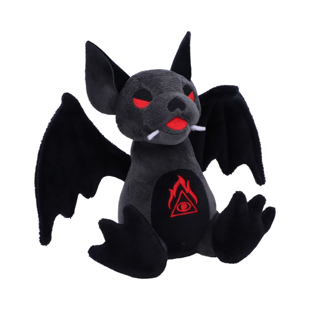 A plush toy bat sits upright, displaying large wings and red eyes. Its fangs are visible, and a red flame design with an eye inside a triangle is on its chest.