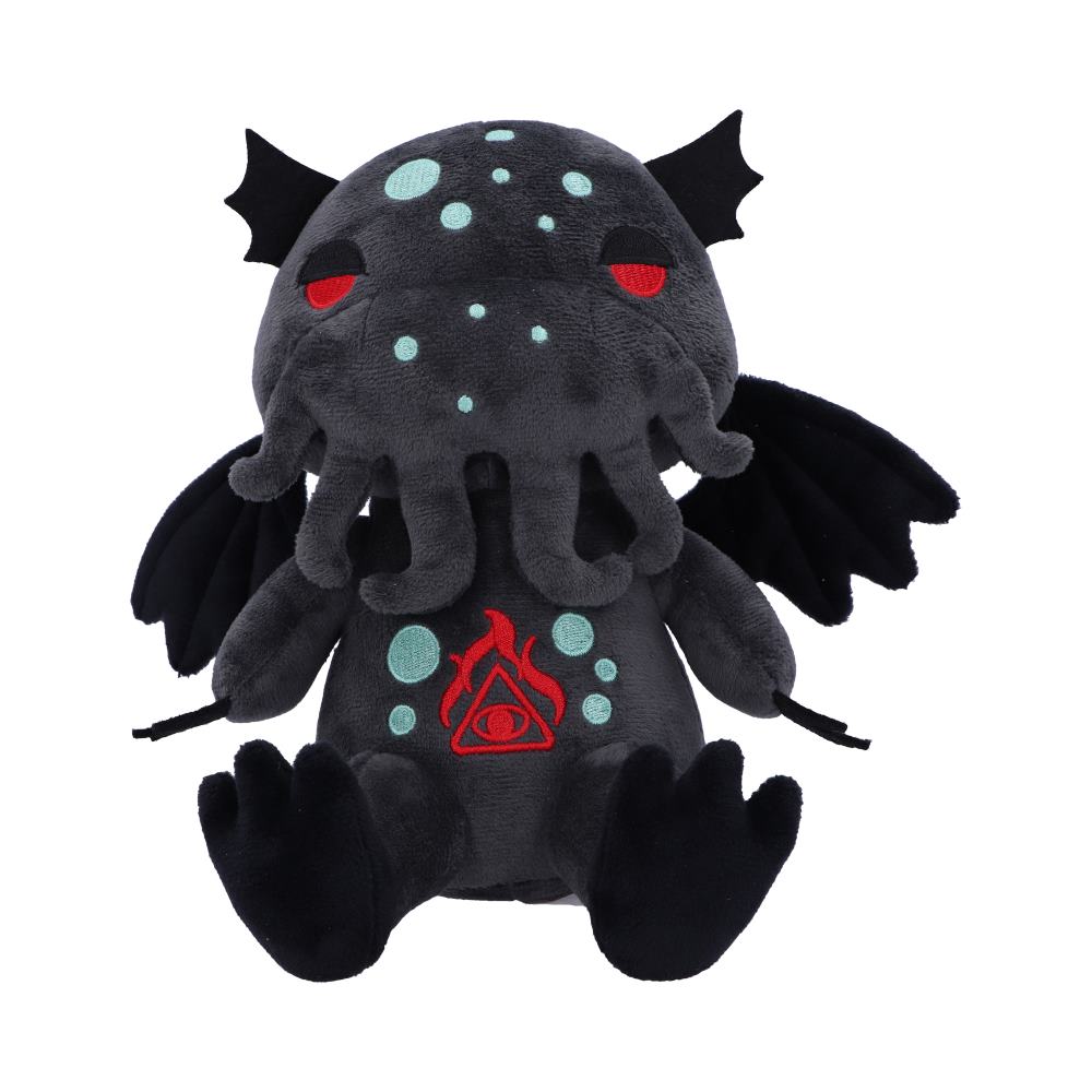A plush Cthulhu doll sits, with black wings, red eyes, and green spots. It features a red flaming eye design on its torso, isolated against a white background.