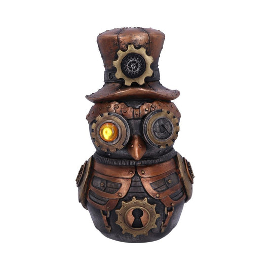 A steampunk-style owl-shaped figurine, featuring gear and bolt details, has one illuminated eye and wears a top hat. It stands against a plain white background.