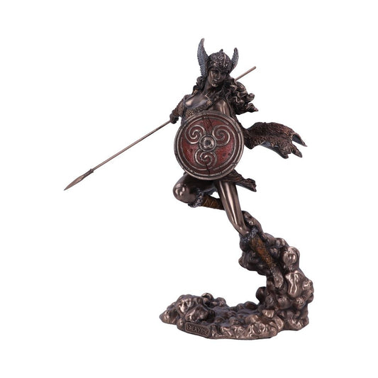 A bronze statue depicts a warrior woman, holding a spear and shield mid-stride. She stands on a cloud-like base. Text on the base reads "VALKYRIE."
