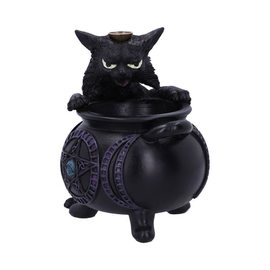 A black, angry-looking cat is peering out of a black, cauldron-like pot. The pot is decorated with a purple pattern and a blue pentagram, sitting on a white background.