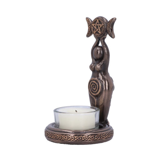 Bronze goddess figurine holds a triple-moon disc with a pentagram above her head while supporting a small glass tealight cup on a decorative round base against a white studio background.