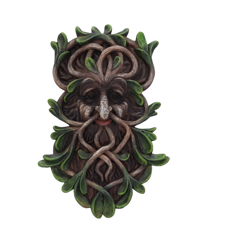 A Green Man wall sculpture features a face composed of twisting wood branches and green leaves. It appears against a plain white background, exuding a natural and mystical aesthetic.