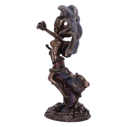 A bronze statue of a woman with elaborate headdress, raising her arm, stands on a rock base with skulls. A snake coils around her waist. Engraved text: "LILITH".