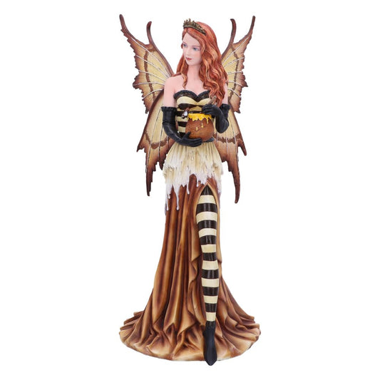 A fairy statue with wings and a crown holds a pot of honey. She wears black gloves, a striped dress, and has red hair, against a plain background.