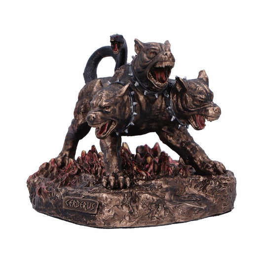 A three-headed dog figurine snarls, standing on a fiery base. The figurine is bronze-colored, with a snake for a tail, and is labeled “CERBERUS”.