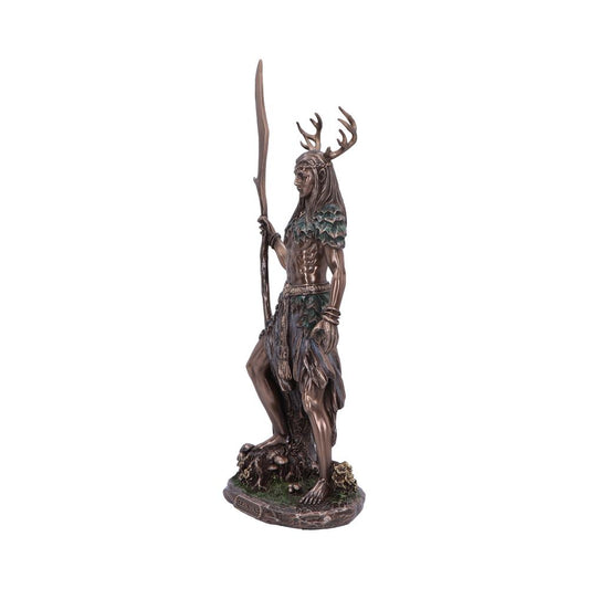 A bronze statue of Cernunnos stands holding a spear, on a small base depicting foliage. The figure is adorned with antlers and leaf-like clothing. "CERNUNNOS" is inscribed on the base.
