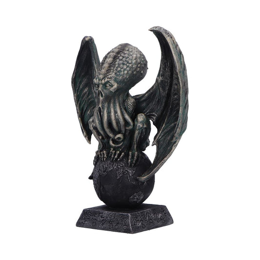 Statue depicts a winged creature with a tentacled face, perched on a textured globe, set on a decorated base in an isolated, plain white background.