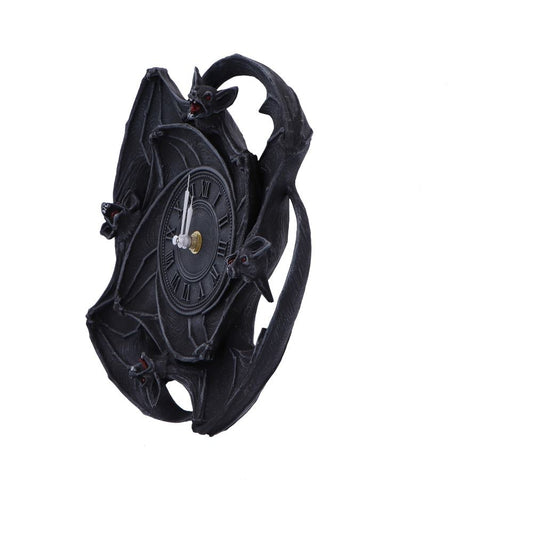 A gothic clock is adorned with bat figures surrounding its face. The clock features Roman numerals and is set against a plain white background.