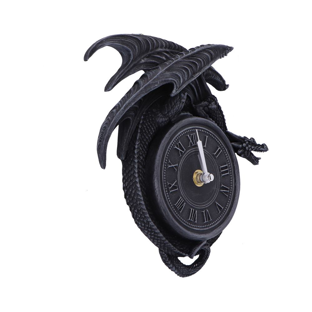 A black dragon sculpture envelops a round clock face with Roman numerals, displaying a decorative, mythical theme. The dragon's wings arch protectively over the clock, suggesting guardianship.
