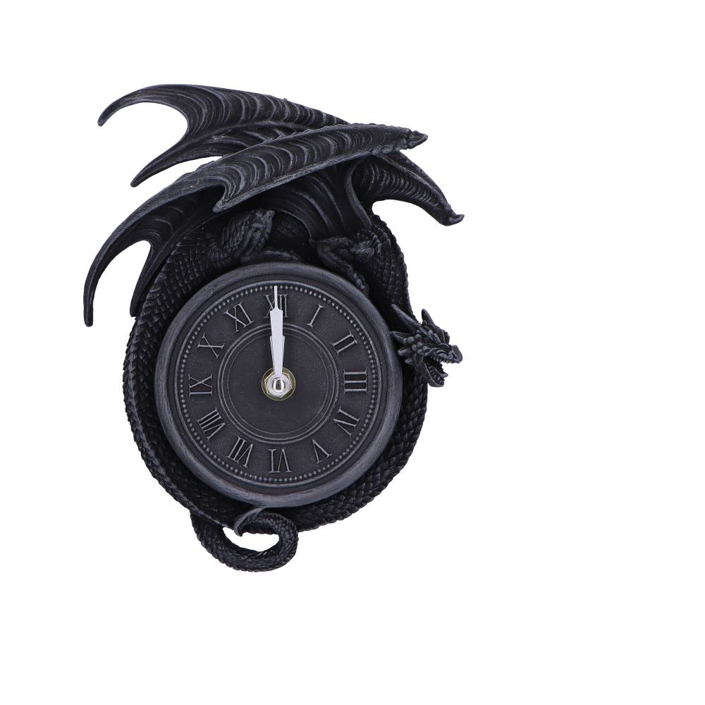A black dragon figurine encircles a clock face with Roman numerals. The dragon's wings are spread above, adding a mythical touch to the timepiece.
