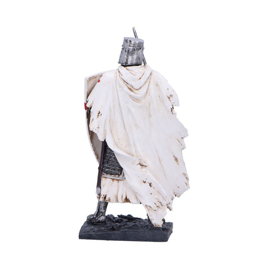 Knight figurine stands facing away, wearing a helm and tattered cloak, gripping a shield and spear while chainmail and greaves show beneath, posed on a rocky base against white background.