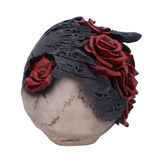 Skull partially covered by tattered black cloth adorned with red roses, photographed against a white background; text on base reads ©2024 GL.