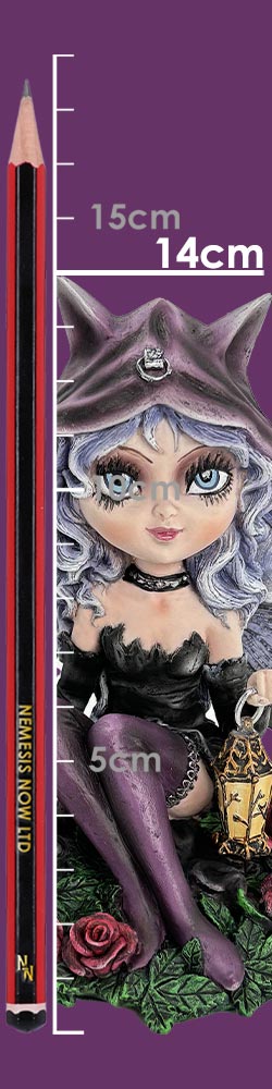 Gothic cat-eared female figurine sits cross-legged holding a lantern against a purple measuring backdrop with a pencil and scale; text reads 15cm 14cm 5cm NEMESIS NOW LTD