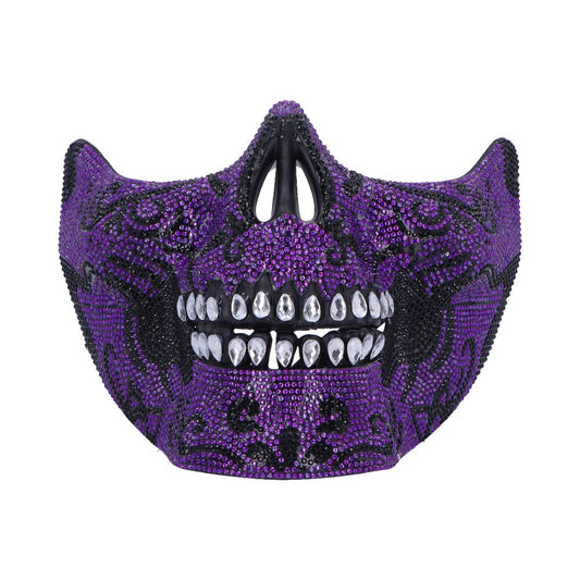 Purple rhinestone skull mask forms a snarling lower-face with jeweled teeth, black decorative patterns and a hollow nose set against a plain white background.