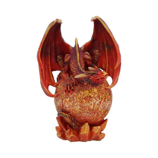Red dragon figurine crouches curled over a mottled orange-yellow orb while spreading its wings atop a jagged crystal-like base on a plain white background.