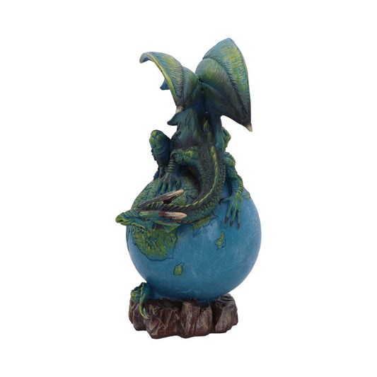 Green blue dragon figurine coils around a blue globe while perched on a rocky base against a plain white background.