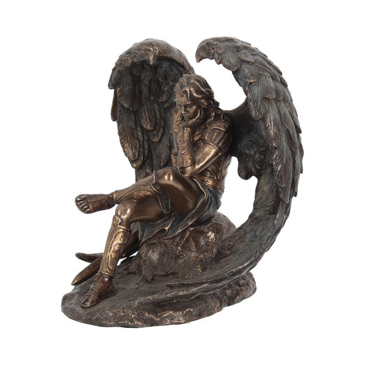 A bronze-colored, winged angel sculpture sits pensively, propped on a rock. His head is rested on his hand against an all-white background.