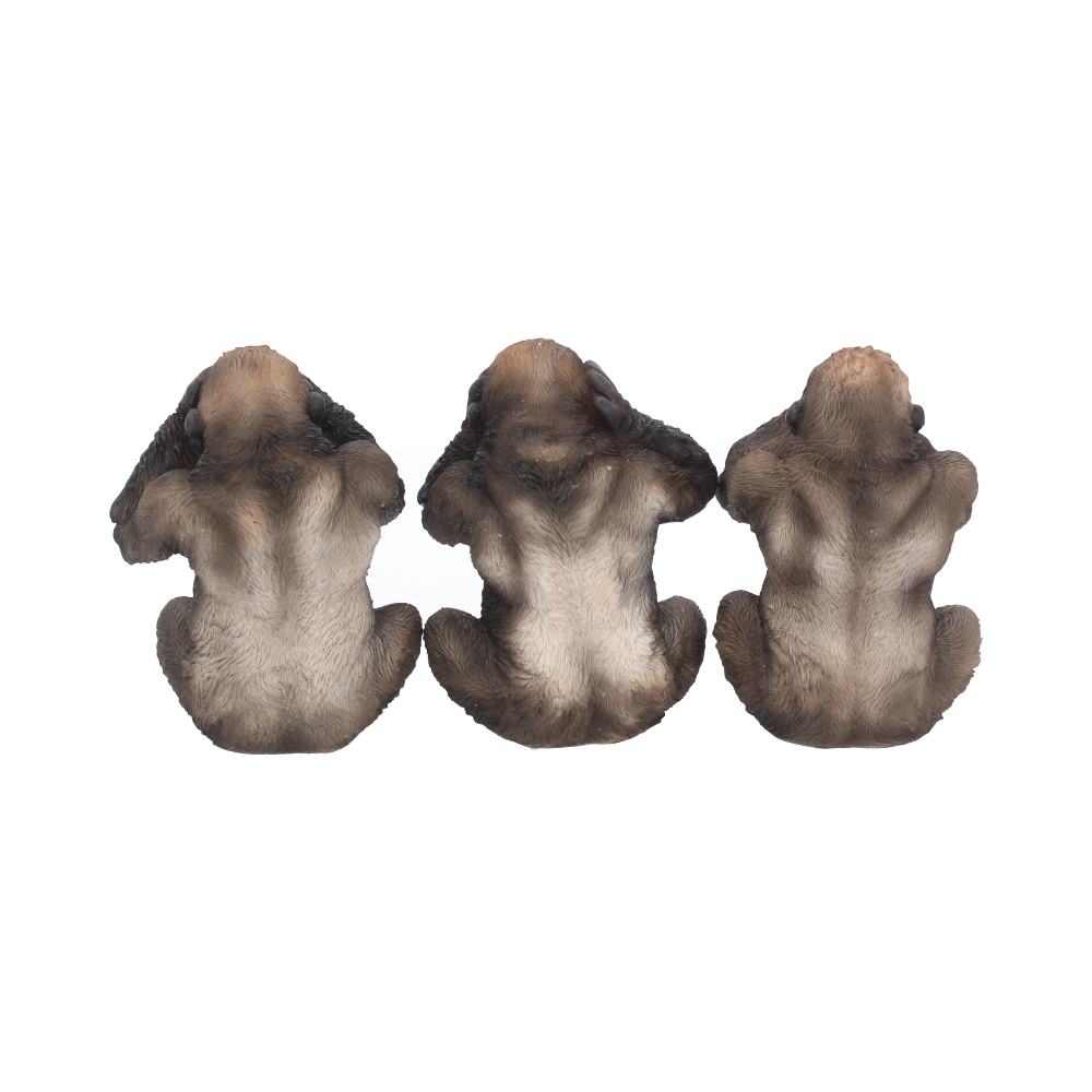 Three gorilla figurines sit in a row on a white background. Each covers either its eyes, ears, or mouth.