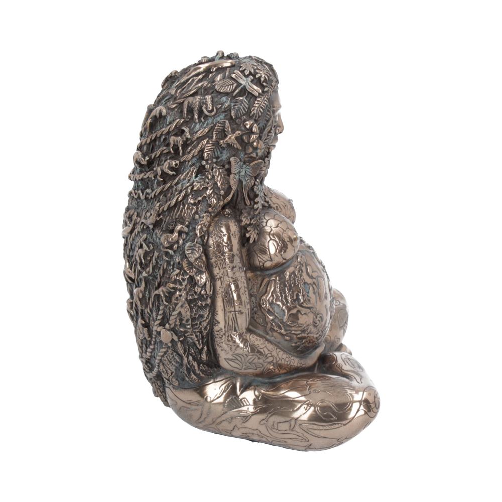A detailed bronze sculpture of a seated woman with flowing hair covered in intricate floral and plant designs, suggesting nature's integration, set against a plain white background.
