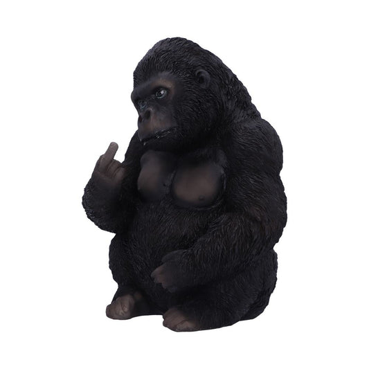 A seated, hairy, black gorilla figurine raises its middle finger. The gorilla is on a white background.