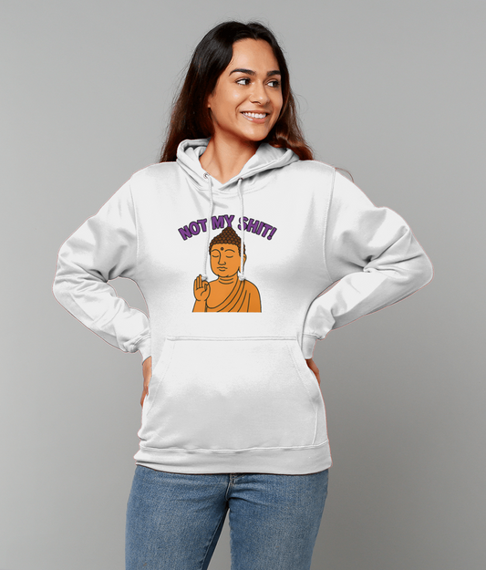 White hoodie reading NOT MY SHIT! with a cartoon Buddha, worn by a smiling person with hands on hips against a neutral gray studio background.