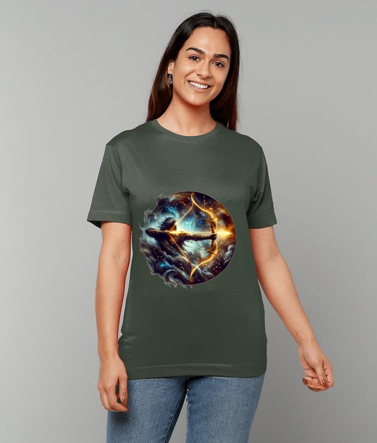 An olive green t-shirt worn by a smiling person displays a glowing circular archer motif pulling a fiery bow amid swirling cosmic clouds against a plain light gray background.