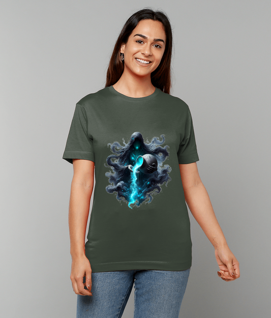 Olive green t-shirt shows a hooded faceless specter holding a cracked orb that pours a glowing blue energy stream; worn by a smiling person against a plain gray studio background.