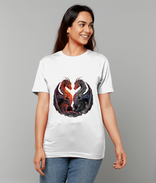 White T-shirt displays two stylized dragons facing each other to form a heart-shaped motif, worn by a smiling woman standing casually against a plain gray background wearing jeans.