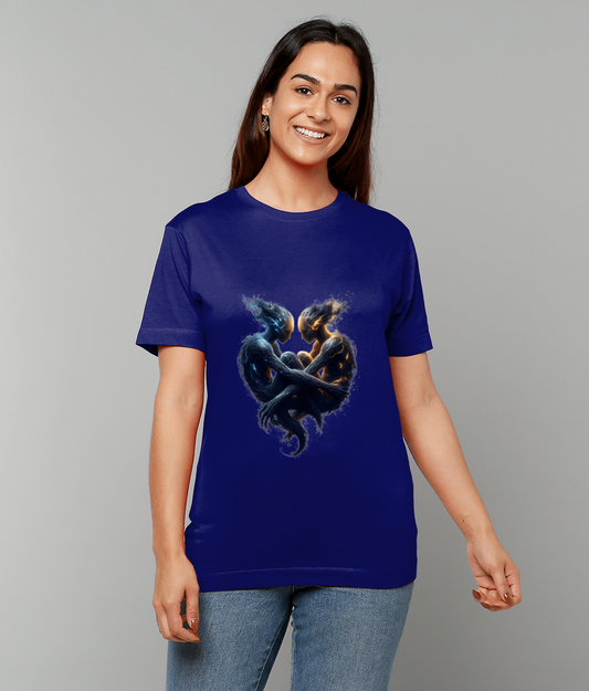 Royal blue T-shirt displaying two entwined elemental humanoids, one blue and one fiery orange, embracing to form a heart shape, worn by a smiling woman standing against a gray background.