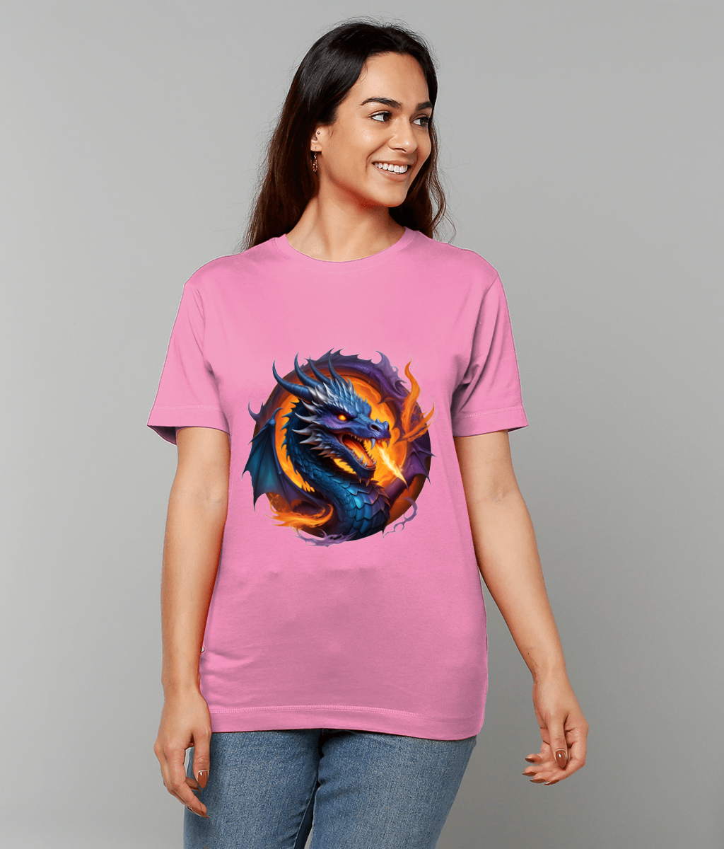 Dragon graphic breathing orange flames printed on a pink T-shirt worn by a smiling woman standing against a neutral gray background.