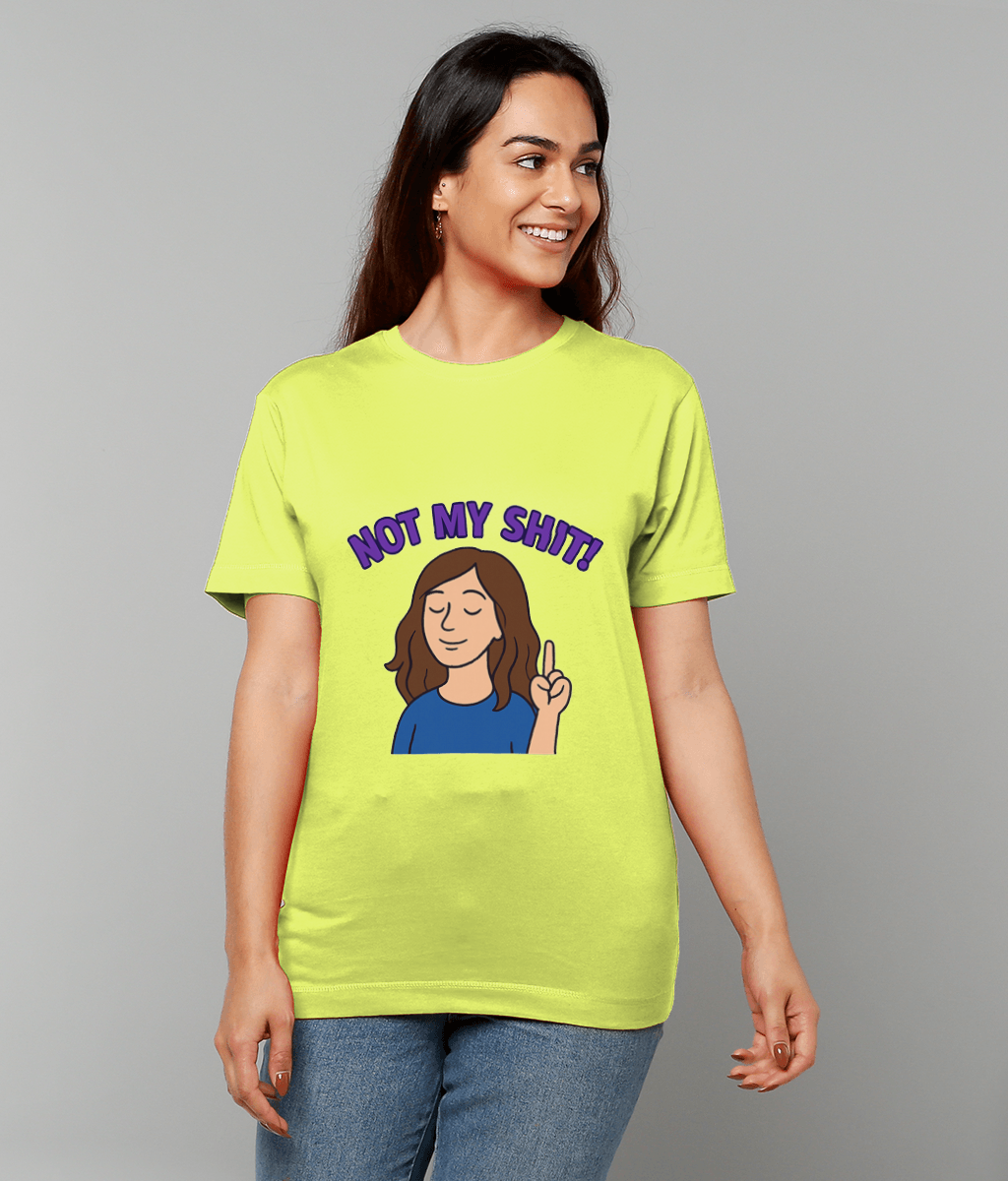Woman wearing a neon yellow T-shirt shows a printed cartoon woman raising a finger; text above reads "NOT MY SHIT!" She smiles and stands against a plain light gray background.