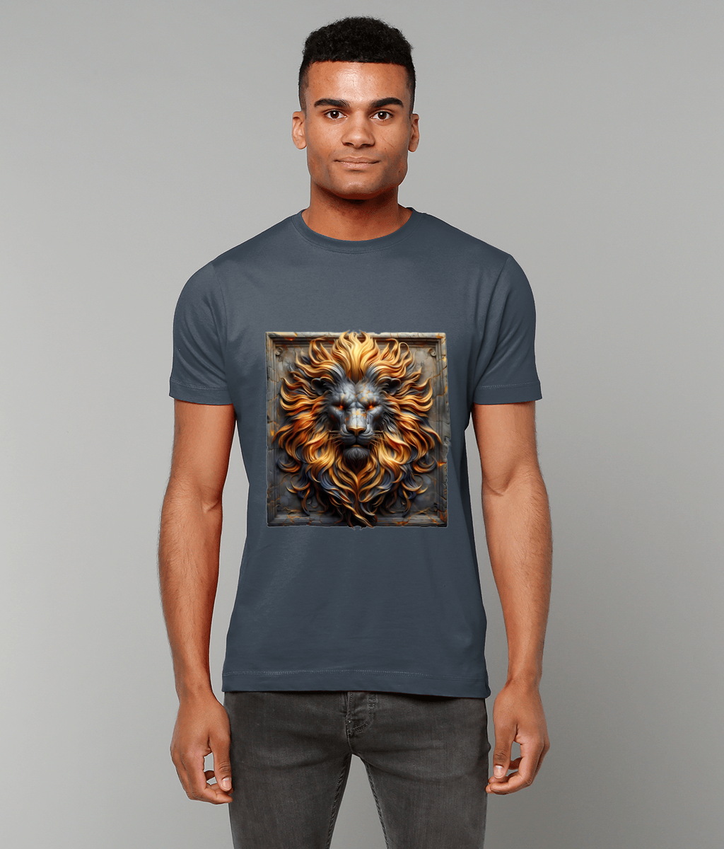 Ornate lion head with flowing golden-orange mane centered inside a square frame on a slate-blue T-shirt, displayed by a standing young man against a plain light gray background.
